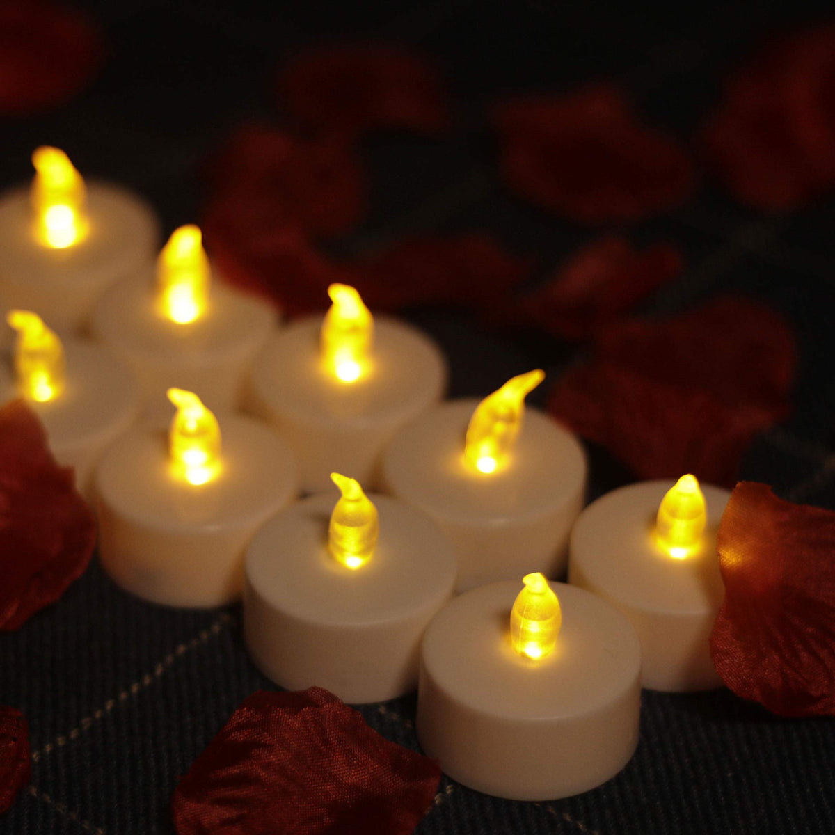 YIWER Tea Lights LED Tea Light Candles 200 Hours Pack of 200 Realistic Flickering Bulb Battery Operated Tea Lights for Seasonal Festival Celebration Electric Fake Candle in Warm Yellow(2 * 100)