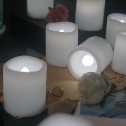 Smallpenglai 12 Pack Flameless Votive Candles Flickering Electric Fake Candles LED Battery Operated Tea Lights for Home Wedding Decor Party Table Halloween Christmas Decorations, White Glow