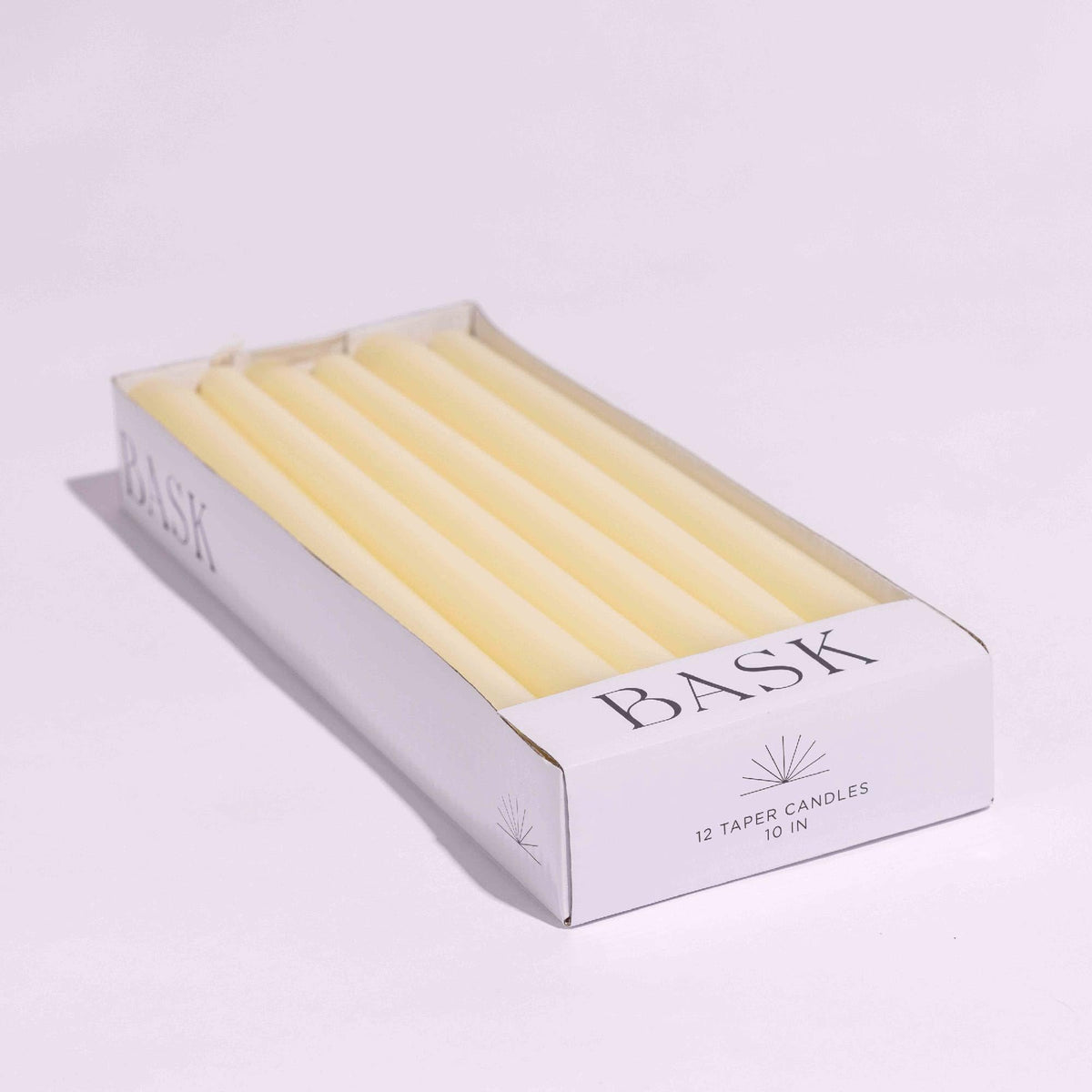 Bask 10-inch Taper Candles - Unscented and Dripless - Burns for 8 Hours - Home Decor for Dinner Table, Kitchen, and Bedroom - Perfect for a Romantic Date or Anniversary - 12-Pack - Ivory