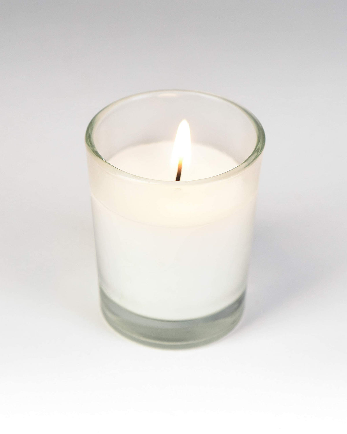 Serene Spaces Living 100-Pack White Unscented Votive Candles in Glass Holders, 10 Hour Burn Time, Bulk Set for Weddings, Events, Parties, Spa, Emergency & Home Decor, 2" Tall x 1.75" Diameter