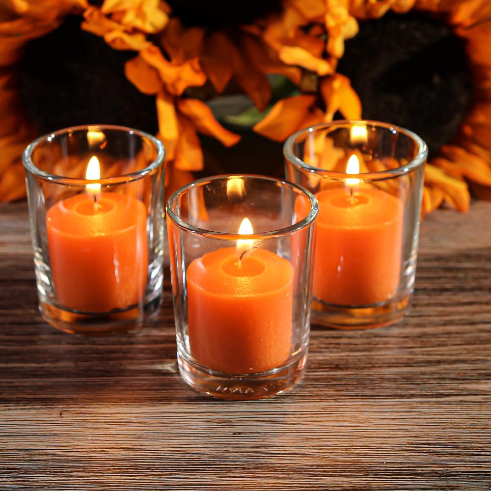 Set of 12 Richland Votive Candles Orange Unscented and 12 Clear Glass Eastland Votive Holders