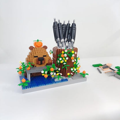 Reading Cute Capybara Desktop Decor - Micro Mini Building Block Toy Pen Holder Animal Style with Flower Perfect as a Gift Representing Love for Learning