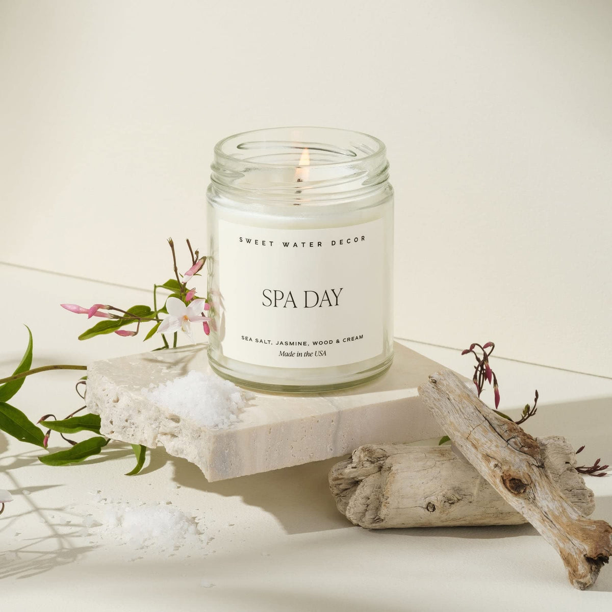 Sweet Water Decor Spa Day Soy Candle - Sea Salt, Jasmine, Wood and Cream Scented Spring Candles for Home - 9oz Clear Jar + Gold Lid, 40+ Hour Burn Time, Made in The USA