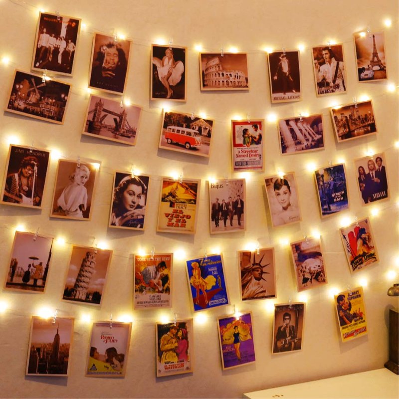 HXWEIYE 50LEDs Photo String Light, Warm White 16.4Ft Battery Powered Fairy Light with 52 Clear Clips & 10 Hooks on Wall for Hanging Picture Dorm Bedroom Party