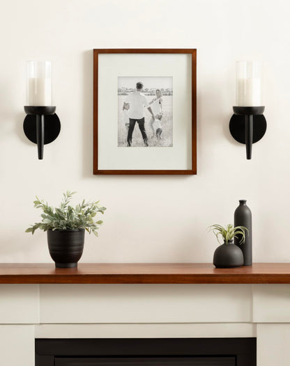 Kate and Laurel Shae Transitional Wooden Wall Sconce; 5 x 5 x 13; Black; Modern Candle Holder with Removable Glass Cylinder for Flameless Pillar Candles in Bedroom or Entryway