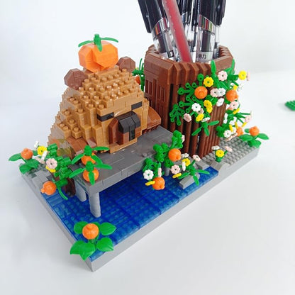Reading Cute Capybara Desktop Decor - Micro Mini Building Block Toy Pen Holder Animal Style with Flower Perfect as a Gift Representing Love for Learning