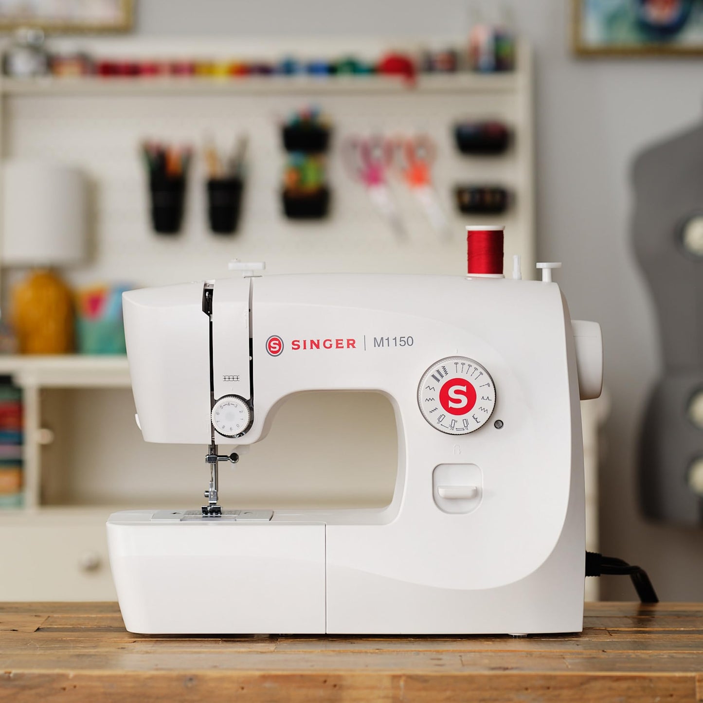 SINGER® M1150 Portable Sewing Machine (White) with Accessories | 16 Built-In Stitches Delivers 45 Stitch Applications | Top Drop-in Bobbin, 4-Step Buttonhole, LED Light | Ideal for Beginners