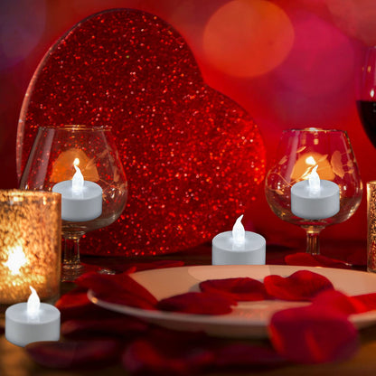 YIWER 100pcs Flameless Tea Lights Candles Realistic LED Flickering Operated Pumkin LED TeaLights Candles Long Lasting Electric Fake Candles Decoration for Party and Gifts Ideas
