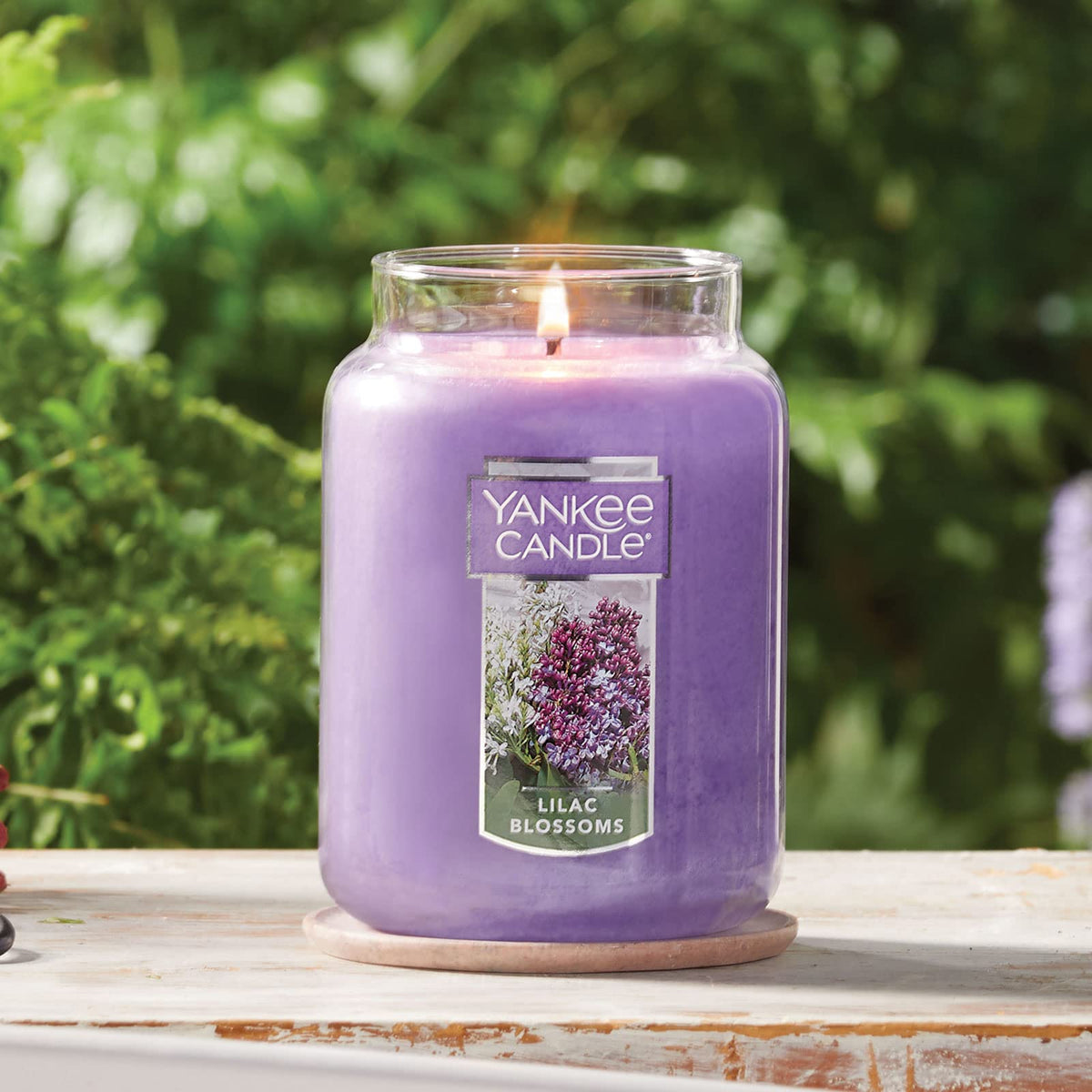 Yankee Candle Lilac Blossoms Scented Classic 22oz Large Jar Single Wick Candle Over 110 Hours of Burn Time Perfect for Gifting Gatherings and Seasonal Decorations