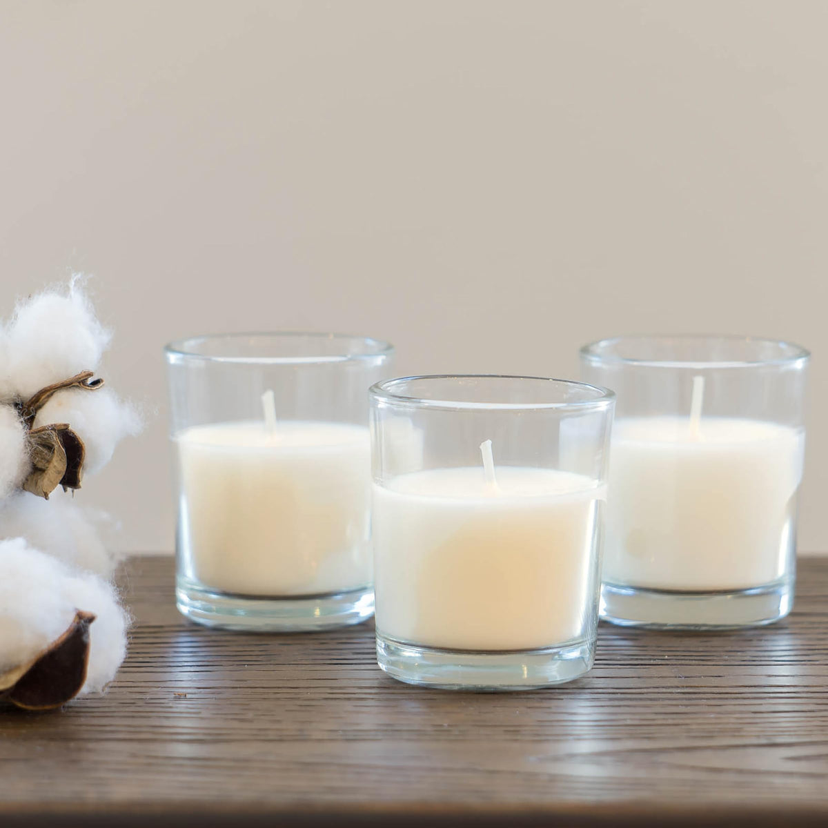Stonebriar 48 Pack Unscented Long Burning Clear Glass Ivory Wax Filled Votive Candles