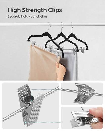 SONGMICS 30 Pack Pants Hangers, 16.7 Inches Long Velvet Trousers Hangers with Adjustable Clips, Heavy-Duty, Non-Slip, Space-Saving for Pants, Skirts, Coats, Dresses, Tank Tops, Black UCRF12B30