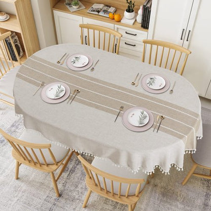 HOMBYS Solid Embroidery Oval Tablecloth with Tassels for Oval Table, 60 x 84 Inch Lace Dust-Proof Table Cover for Kitchen Dinning, Wrinkle Free Anti-Fading Tabletop Decoration