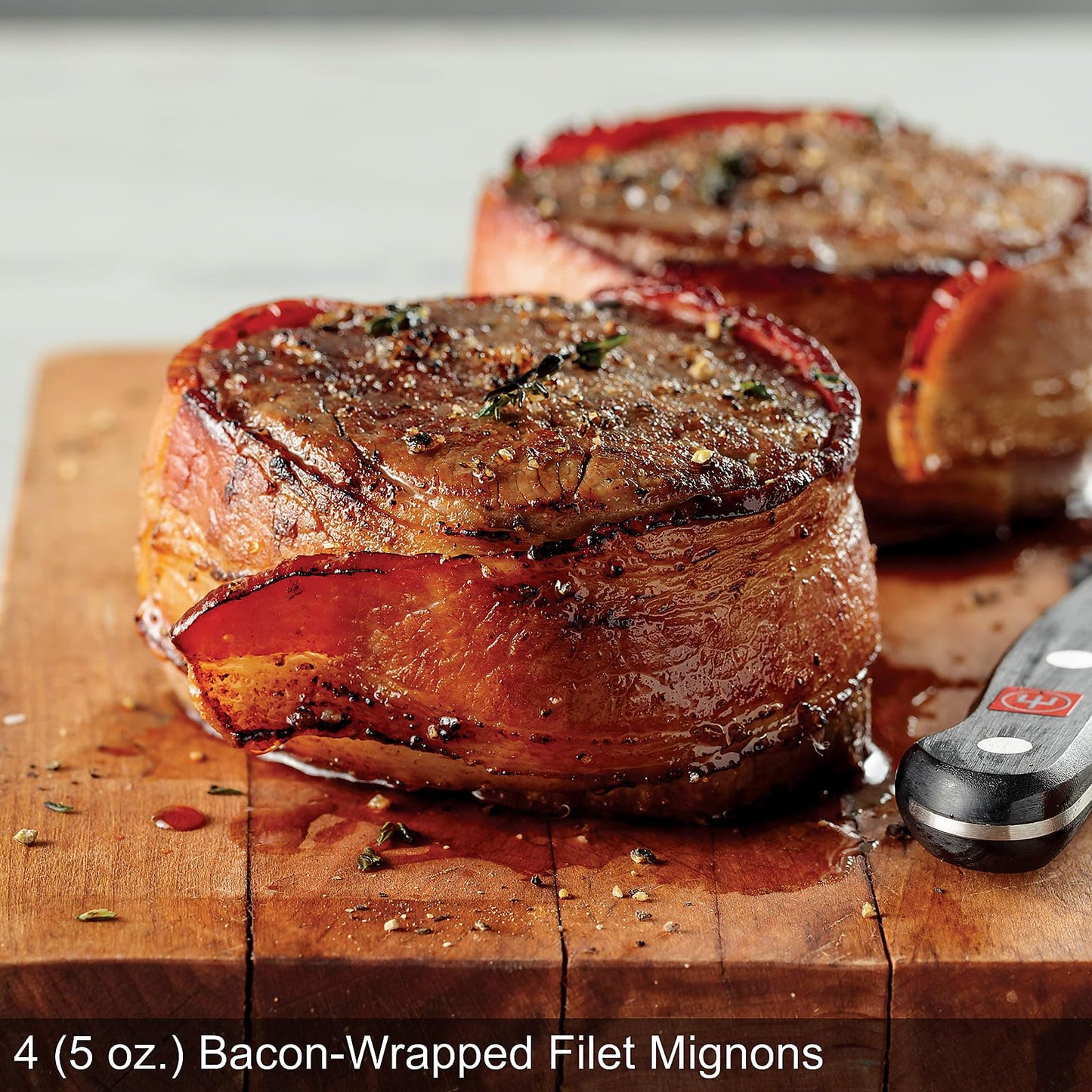 Omaha Steaks Deluxe Gift Package (4 Bacon-Wrapped Filet Mignons, 4 Steak Burgers, 4 Gourmet Jumbo Franks, 4 Potatoes au Gratin, 4 Caramel Apple Tartlets, 1 jar Omaha Steaks Seasoning)