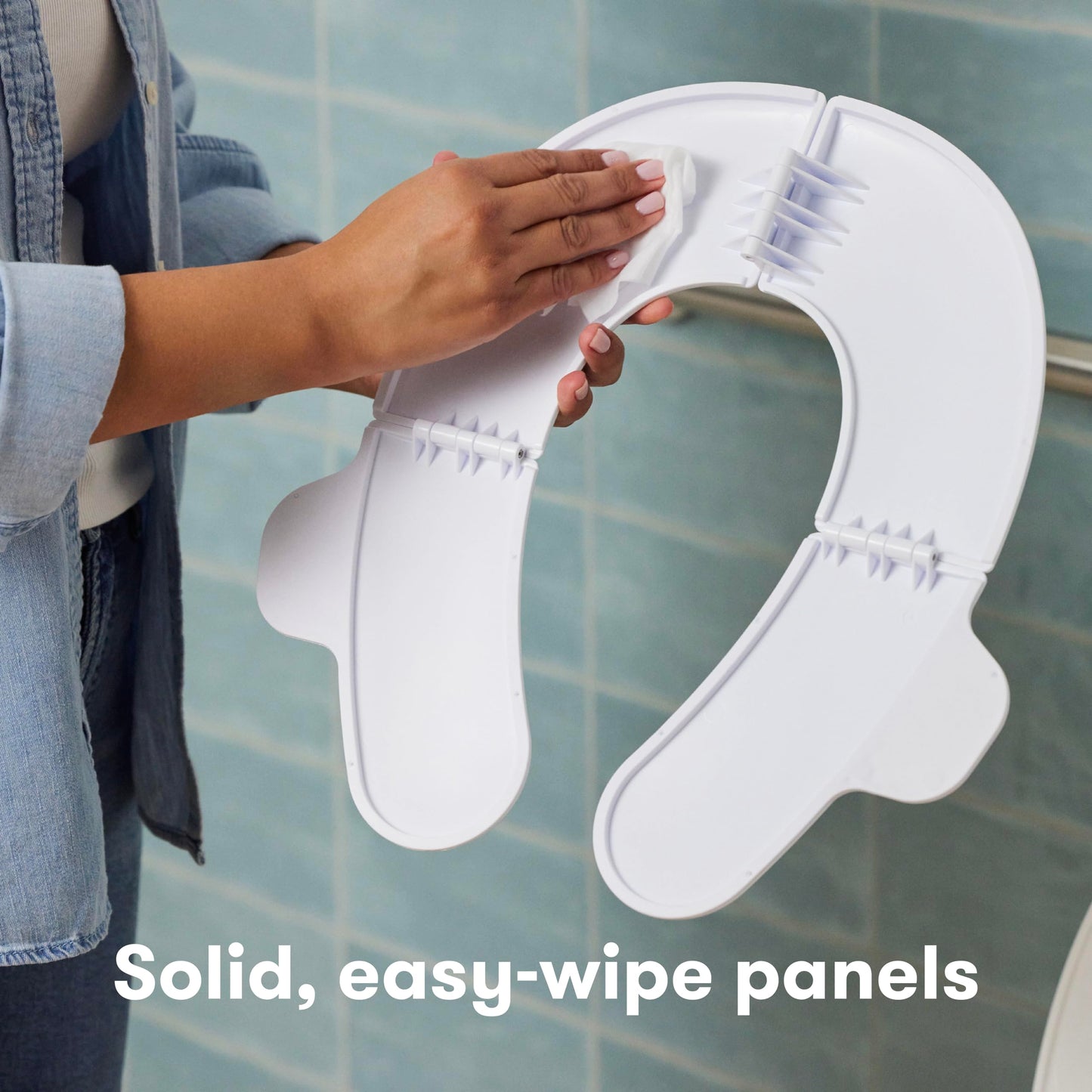 Frida Baby Fold-and-Go Portable Potty Seat for Toilet, Foldable Travel Potty Seat for Toddler, Fits Round & Oval Toilets, Non-Slip Base, Handles, Includes Free Travel Bag