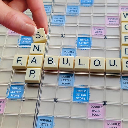 Scrabble to Go by Winning Moves Games USA a Travel Version of The World's Favorite Word Game for 2 to 4 Players Ages 8+ (1202)