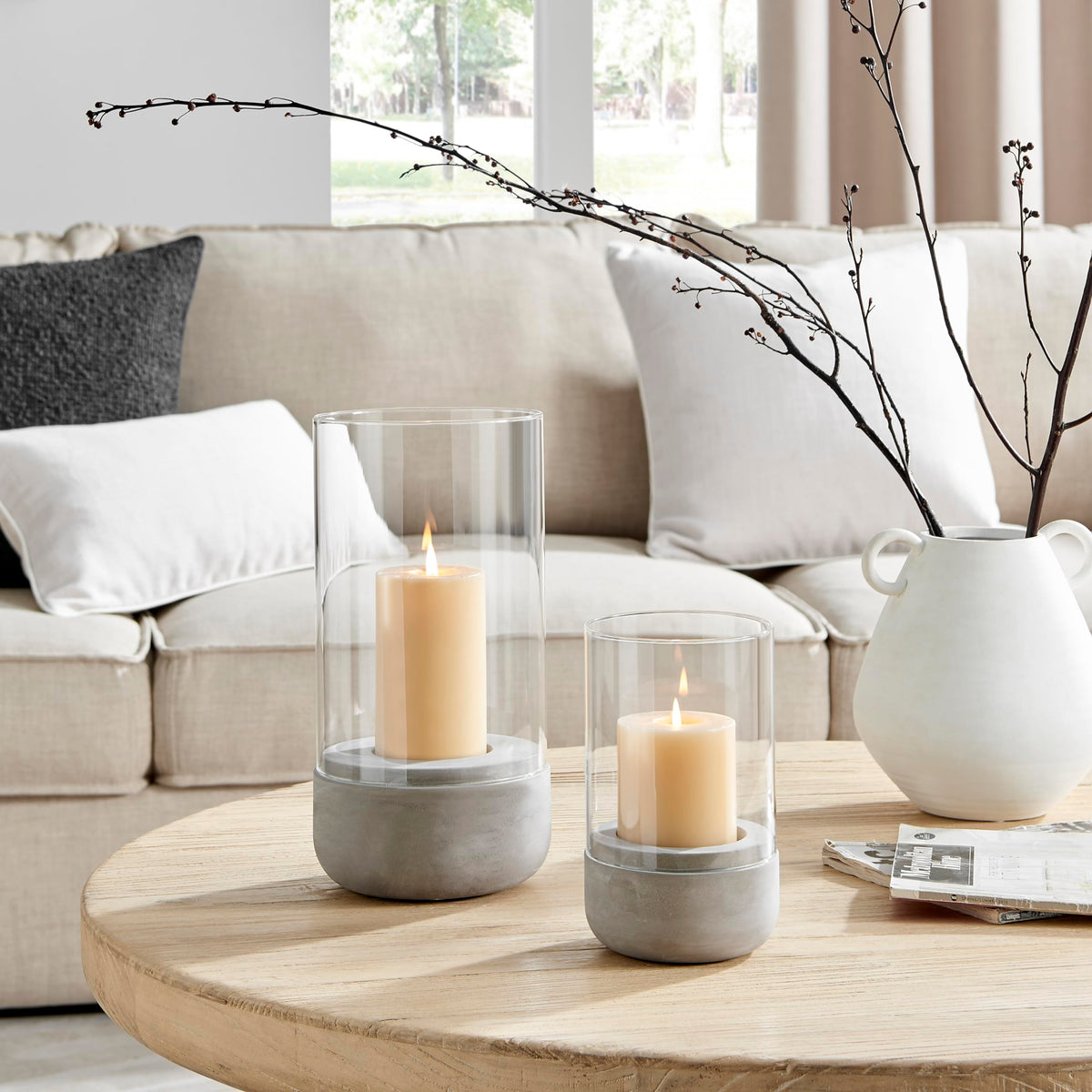 Danya B. Modern Cool Gray Cement Base and Glass Pillar Hurricane Candle Holder (Small)