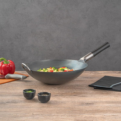 Restaurantware Carbon Steel Wok 1 Pack of 14 Inch Heavy-Duty Uniform Heat Distribution Pan Induction Compatible Round Bottom Wok Welded Handle Black For Gas Stovetops And Grills