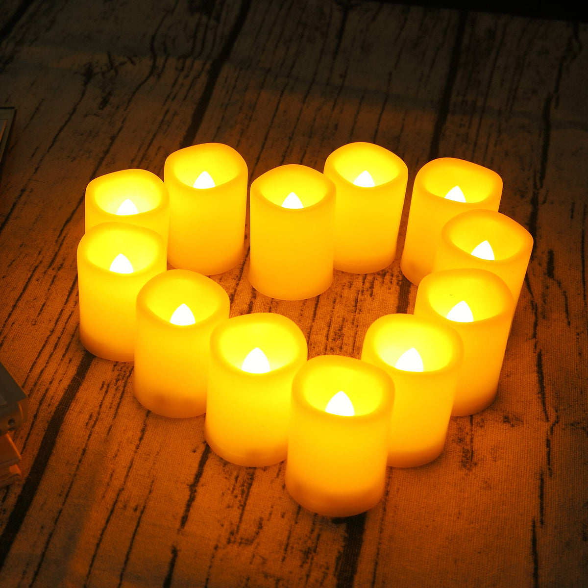 12 PCS Battery Operated Flameless Votive Candles LED Flickering Electric Fake Tea Lights Set Bulk for Christmas Wedding Party Decorations Home Décor, White Base Amber Glow, Batteries Incl.