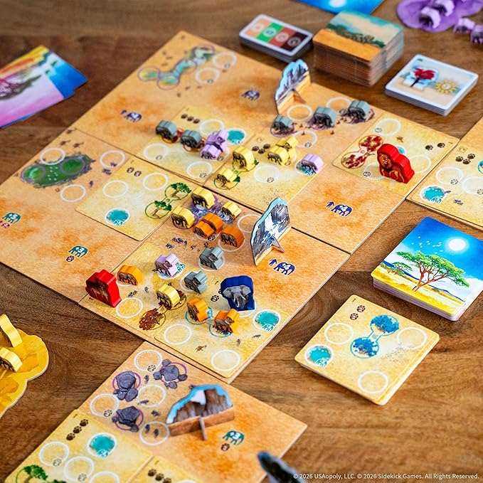 Tembo: Survival On The Savanna Board Game Guide Your Elephant Herd Across Dangerous Terrain A Cooperative Strategic Game for Families and Adults Solo Campaign Included 1-4 Players Ages 10+