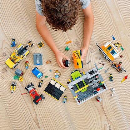 LEGO City Tuning Workshop 60258 Features a Toy Garage Car Shop Camping Trailer Motorcycle Crane and Tow Truck in One Fun Playset Makes a Great Gift for Kids