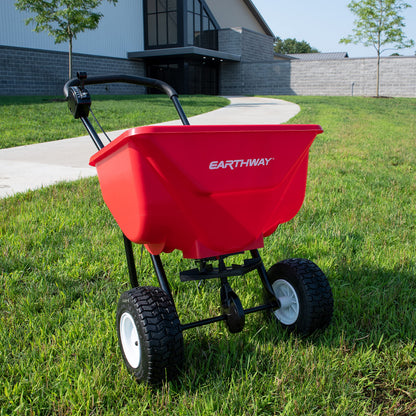 EarthWay 2030P-Plus 65 LB (29 KG) Capacity Commercial Walk-Behind Broadcast Spreader for Grass, Fertilizer, Seeds — Includes Side Spread Control, Even Spread, Pneumatic Tires
